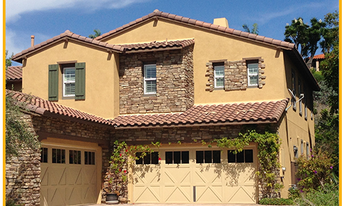 Exterior Painted with the garage doors.