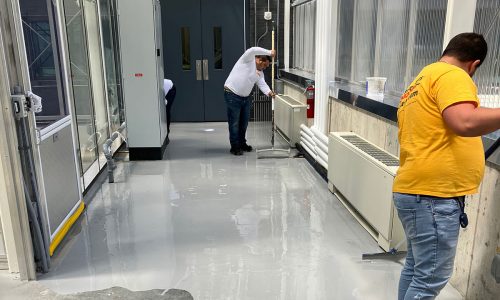 Workers Applying Epoxy