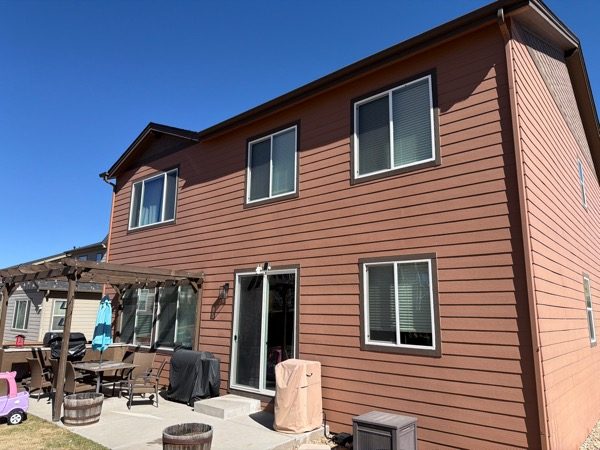 house exterior with rust colored siding before repant Preview Image 5