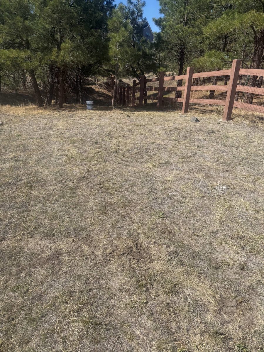 stained split rail fence surrounding residential neighborhood Preview Image 5