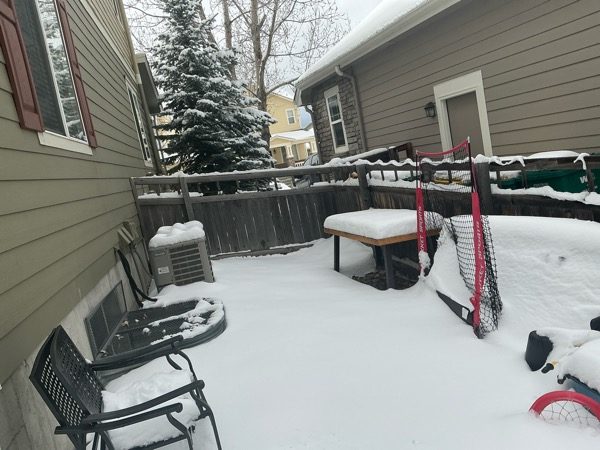 home outdoor seating area covered in snow Preview Image 7