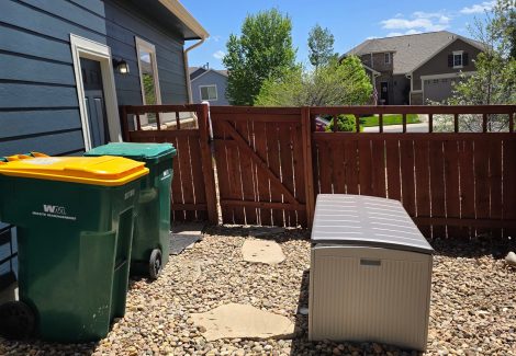 stained wooden fence outside of a home