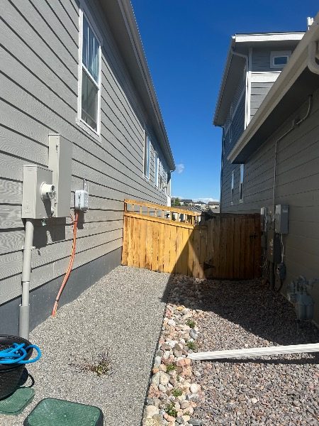 unstained fence gate between houses Preview Image 4