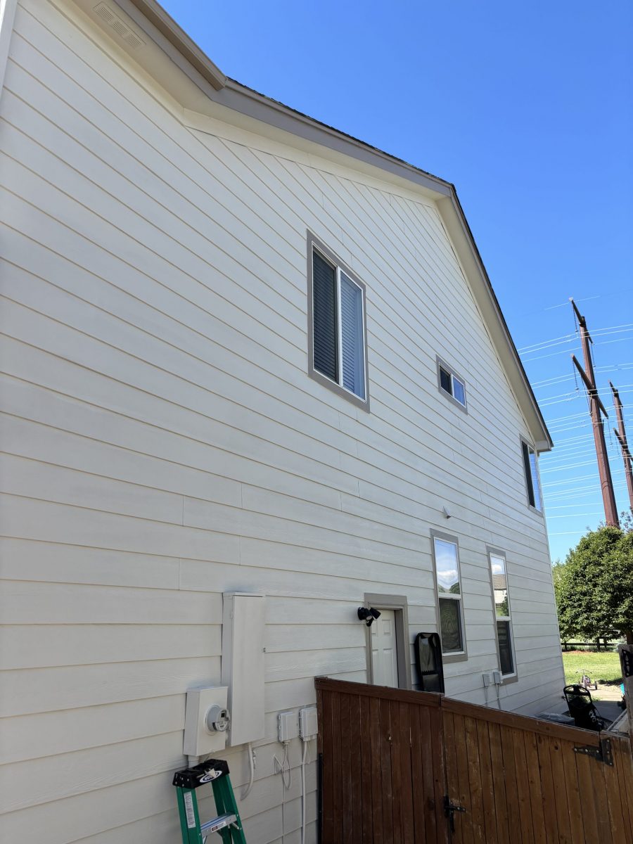side enterior of house with white painted siding Preview Image 2