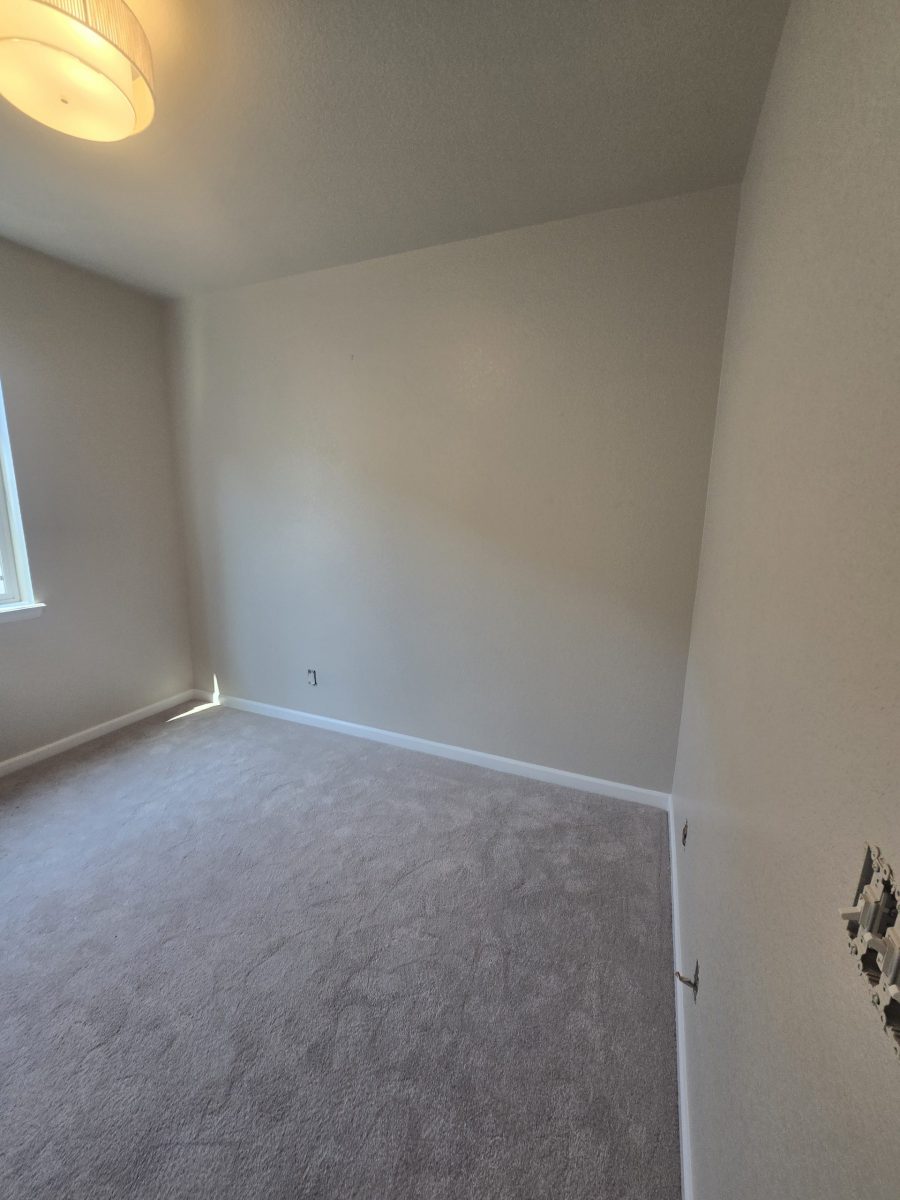 empty room interior with off white walls and carpeting Preview Image 3