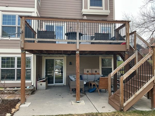raised wooden deck attached to home with peeling paint Preview Image 5