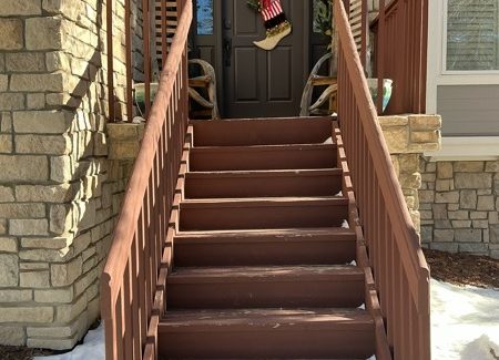 wooden steps to door of house