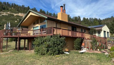 painted exterior of house with wood siding