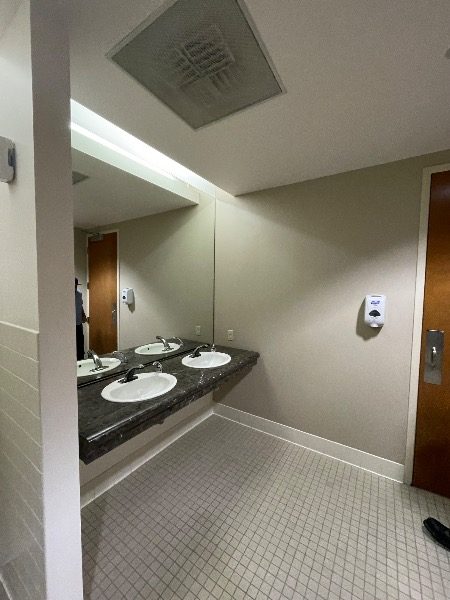 commercial restroom sink area before paint update Preview Image 10