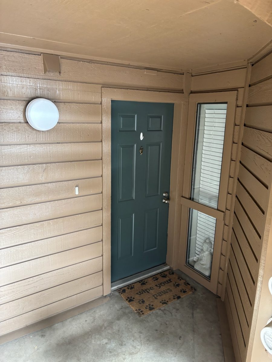 repainted siding and door of condo Preview Image 3