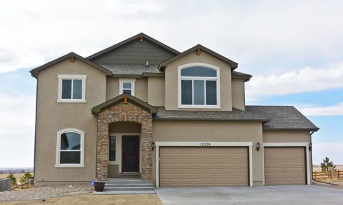 Stucco Home with Popouts