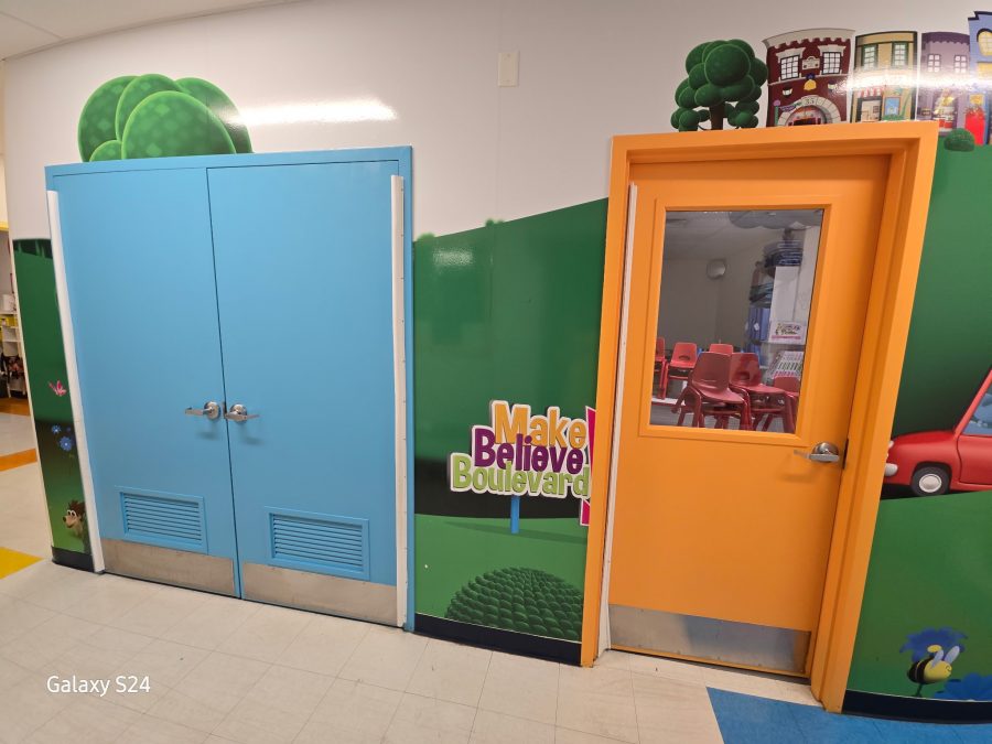 preschool hallway with colorfully painted classroom doors Preview Image 10
