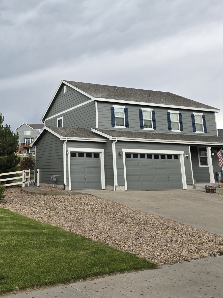 front of house with grey painted siding