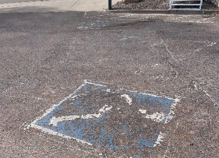 faded parking lot striping