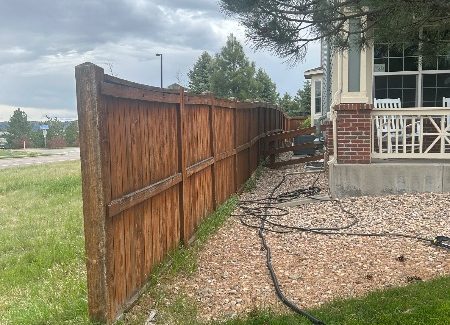 worn stained wooden fence