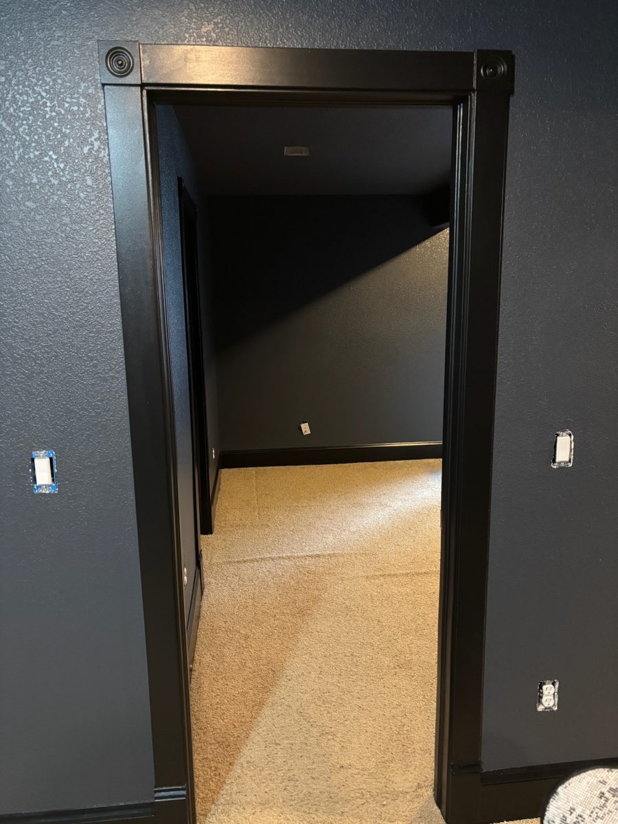 doorway with dark walls and trim Preview Image 1