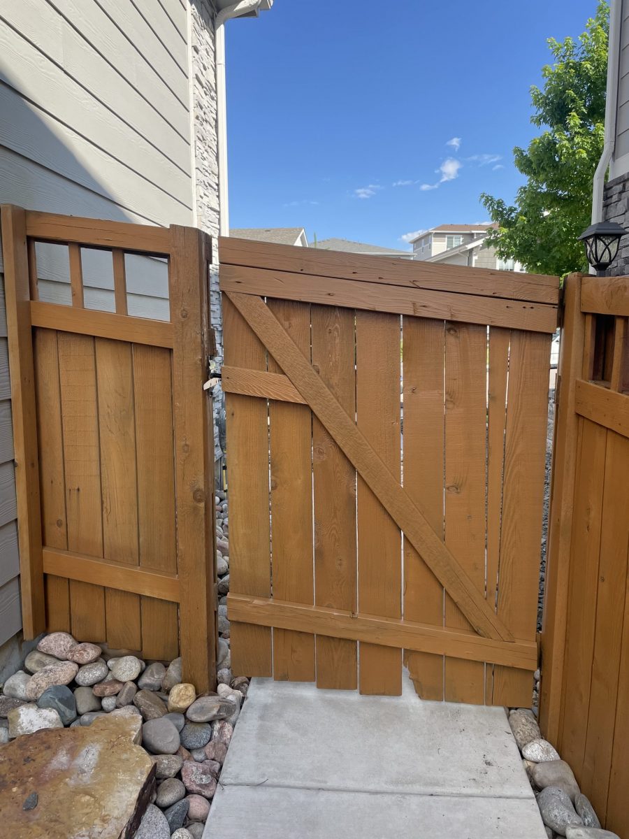 stained fence gate against house Preview Image 2