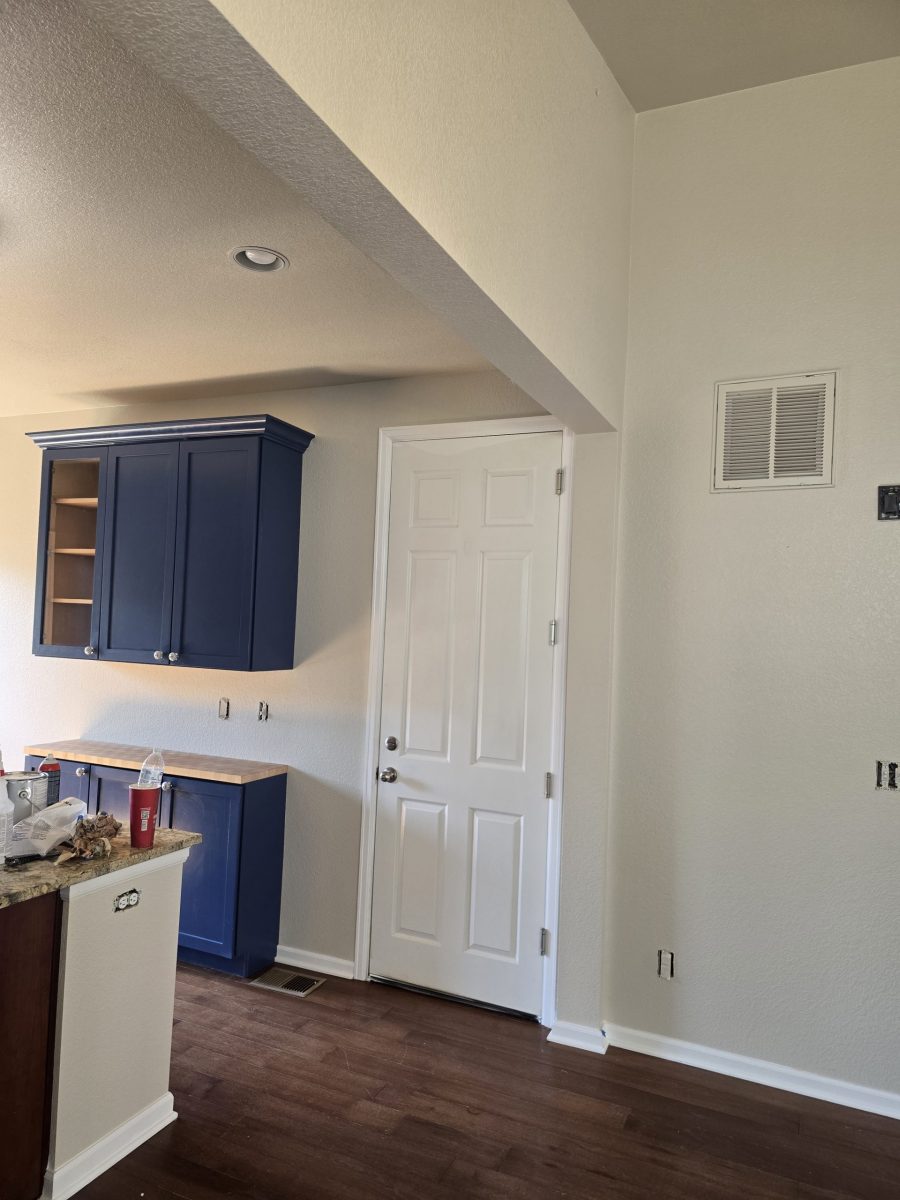 mounted blue cabinets in white home kitchen Preview Image 2