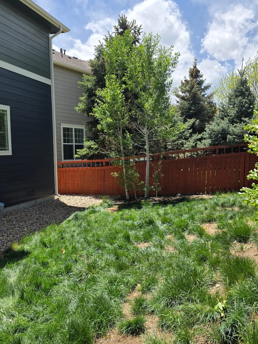 stained wooden fence outside of a home Preview Image 1