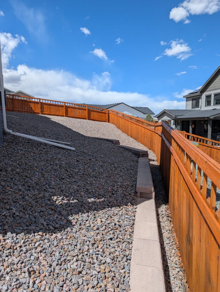 stained wooden fence dividing multiple houses Preview Image 1