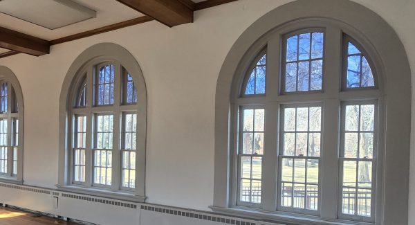 painted interior space with arched windows