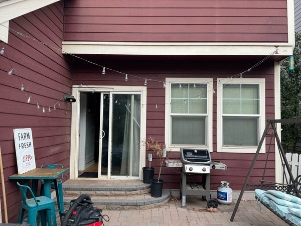 house exterior with marroon siding and white trim Preview Image 7