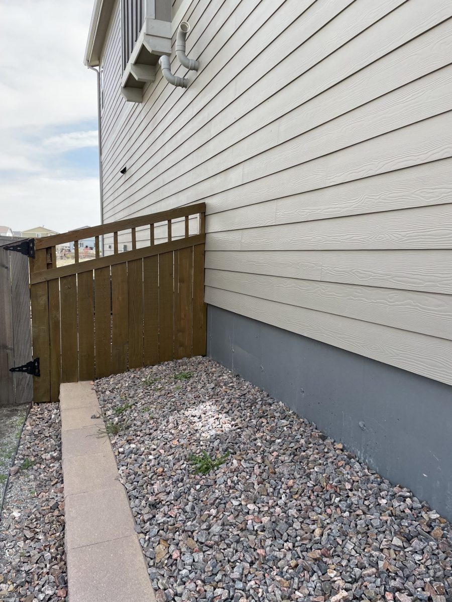 wooden fence against house Preview Image 1