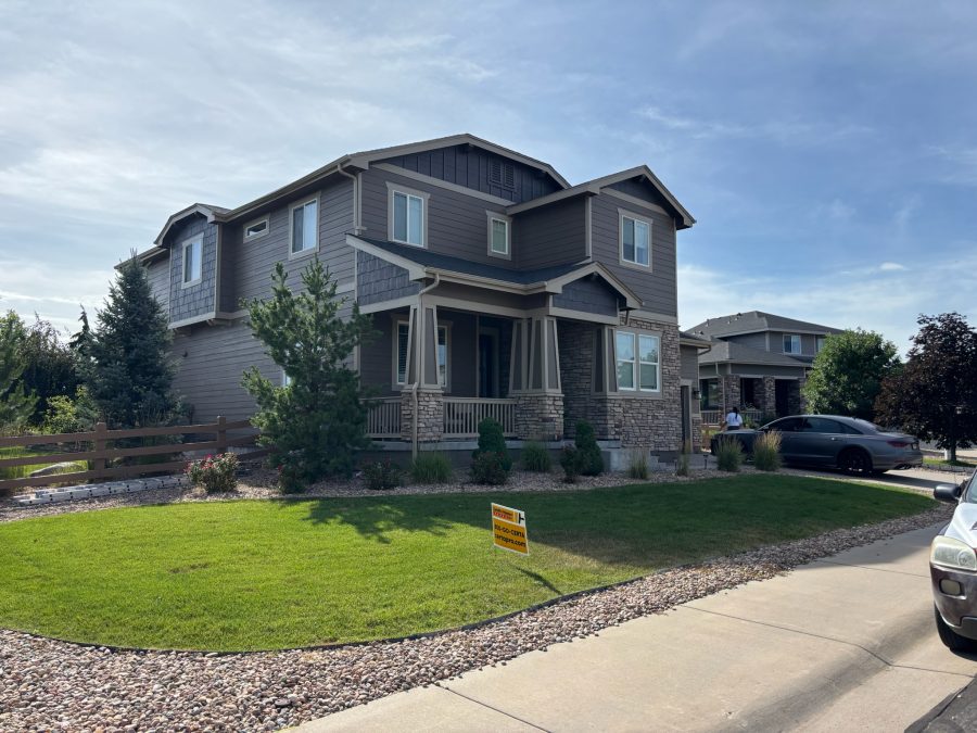 street view of repainted house and front yard