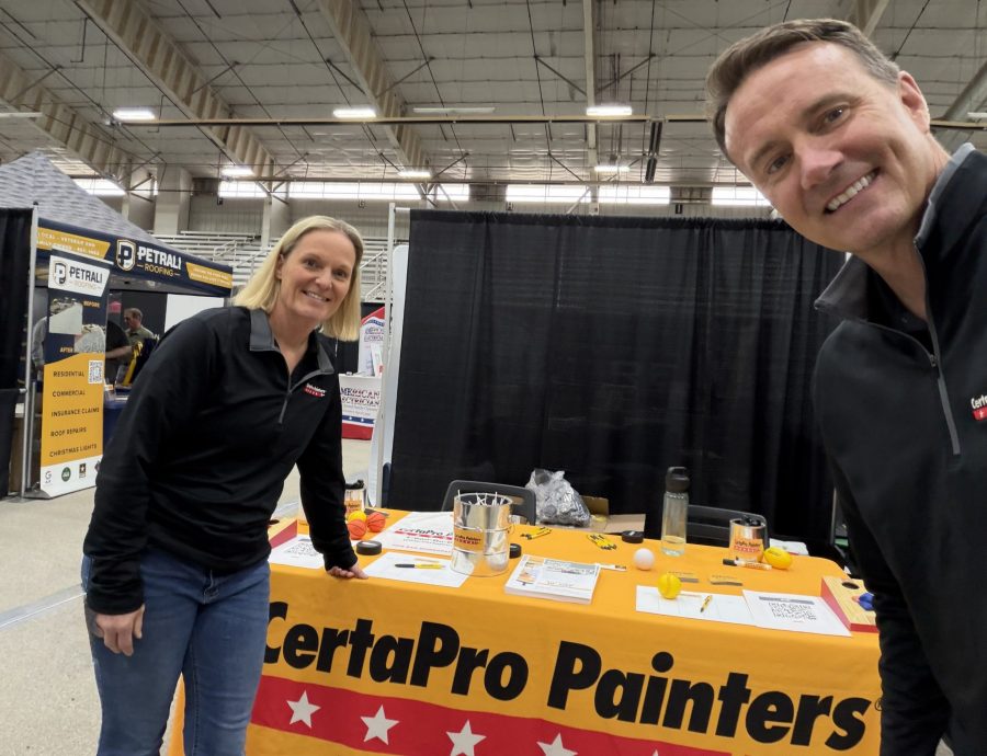 woman and man smiling in front of certapro table Preview Image 2