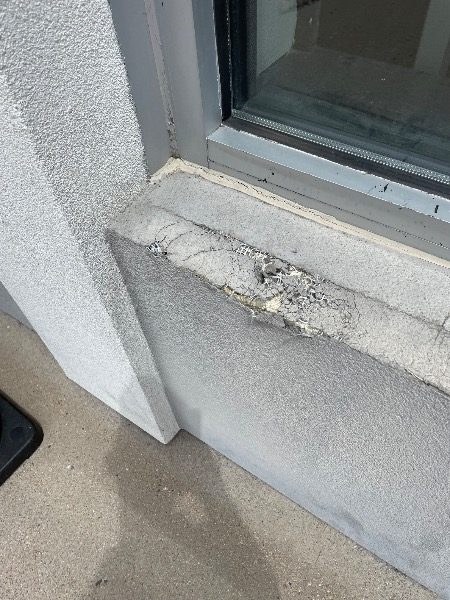 exterior of verizon retail building with damaged stucco Preview Image 3