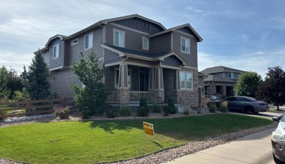street view of repainted house and front yard