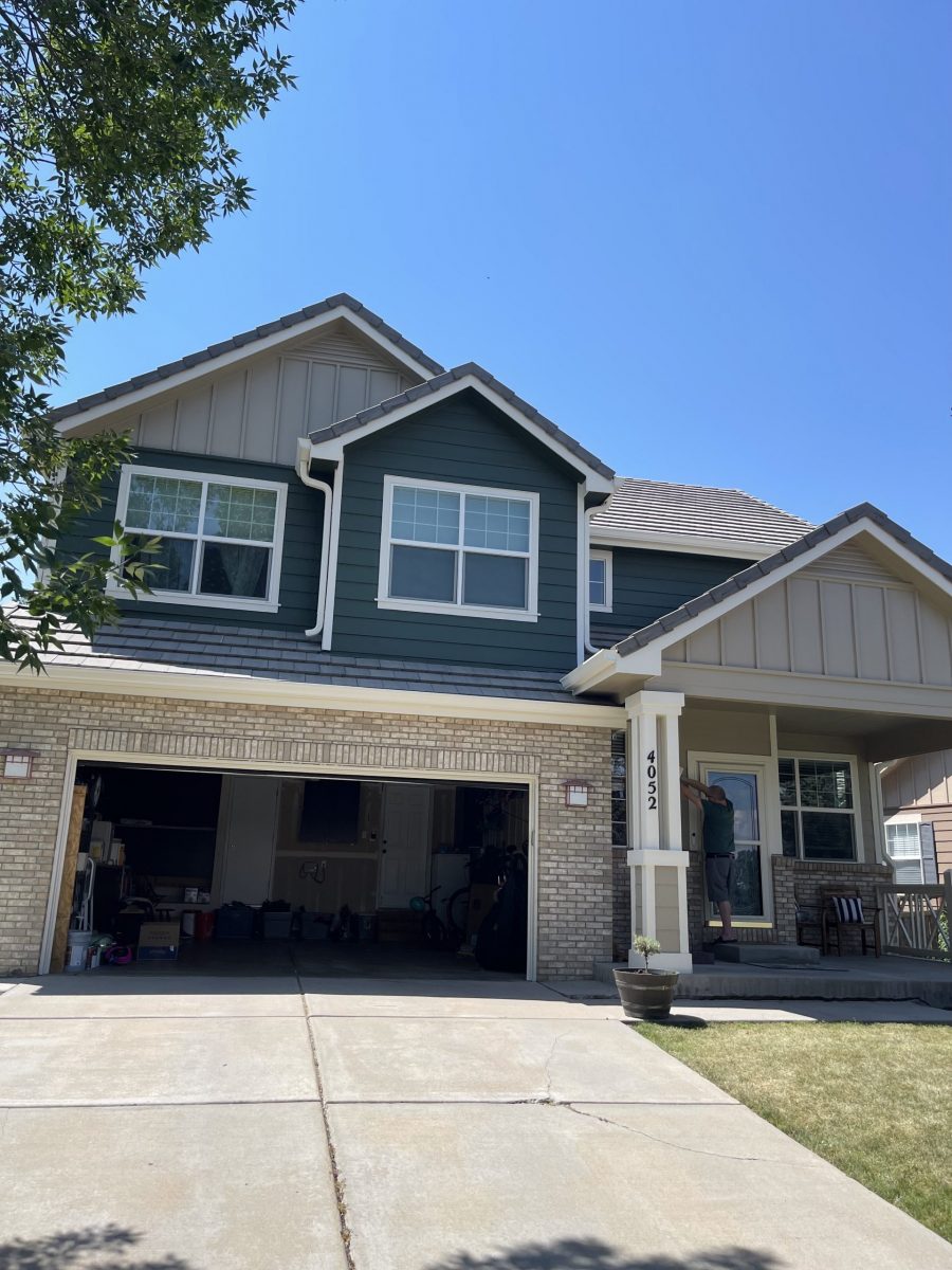 driveway and open garage door of house
