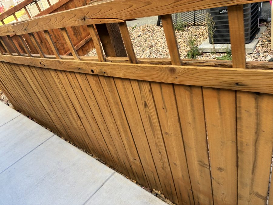 stained wooden fence surrounding house Preview Image 2