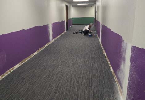 hallway with purple lower section