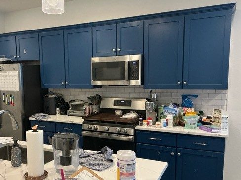 kitchen with blue cabinets Preview Image 4