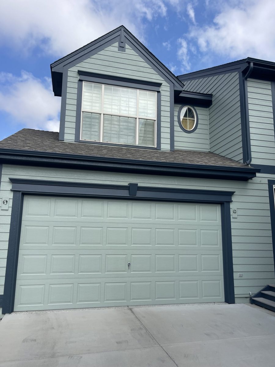painted house exterior with light seafoam green siding and navy trim Preview Image 3