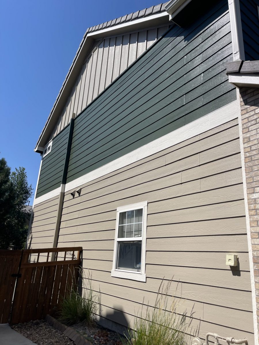 side of house with green and tan siding Preview Image 3