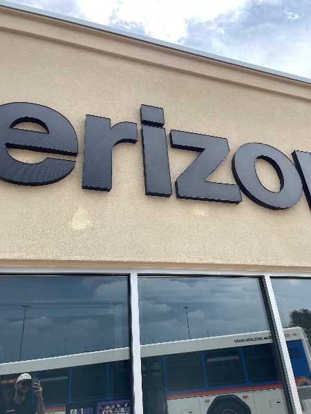 exterior of verizon retail building with damaged stucco Preview Image 2