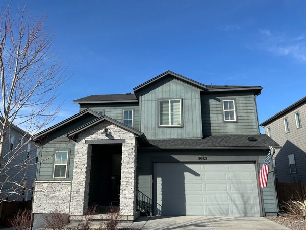 house exterior with dark teal siding before repaint Preview Image 6