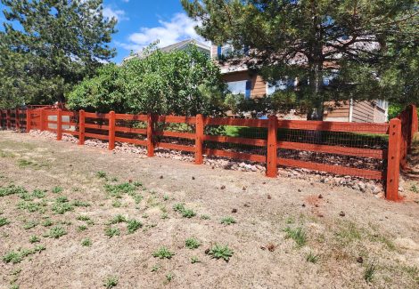 repainted split rail fence