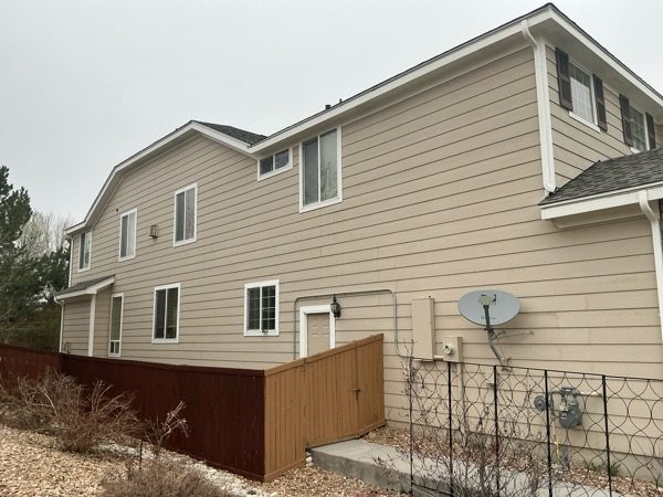 side view of house and driveway before painting project Preview Image 7