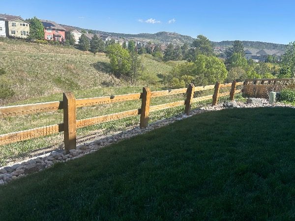 unstained fence surrounding house and yard Preview Image 6