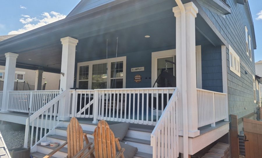 house exterior with blue siding and white porch pillars and railing Preview Image 1