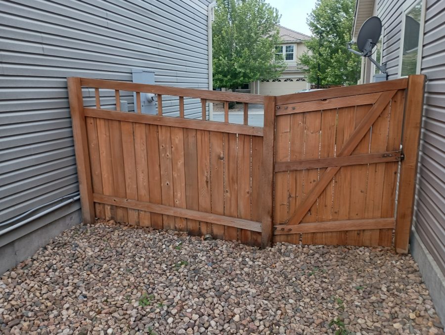 stained fence surrounding home and yard Preview Image 5