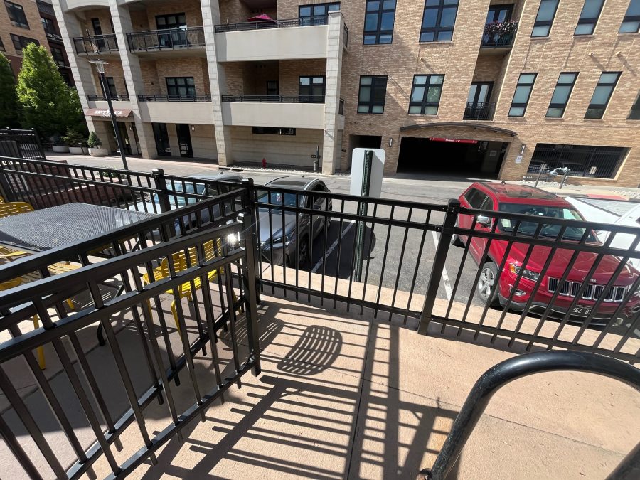 black painted railing along street-facing building exterior Preview Image 2