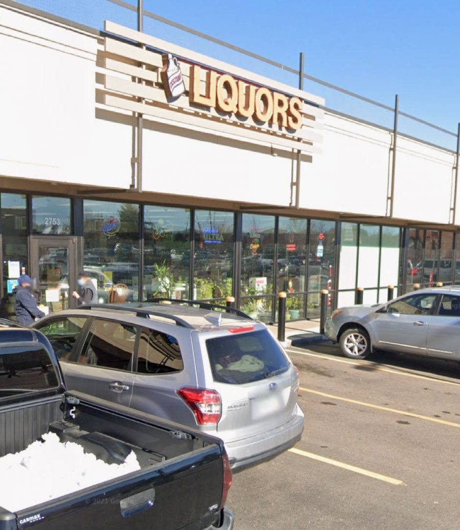 cars parked in front of shopping center Preview Image 11