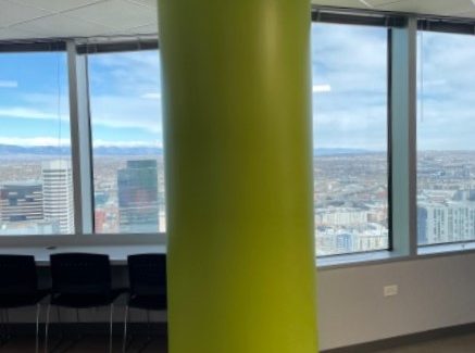 green painted pillar in office space