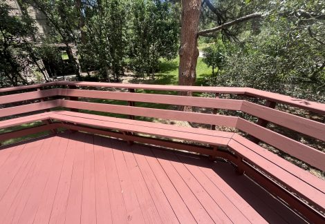 stained deck with built in bench