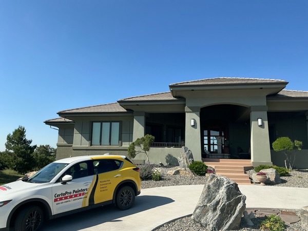 certapro car parked in front of painted stucco home Preview Image 6
