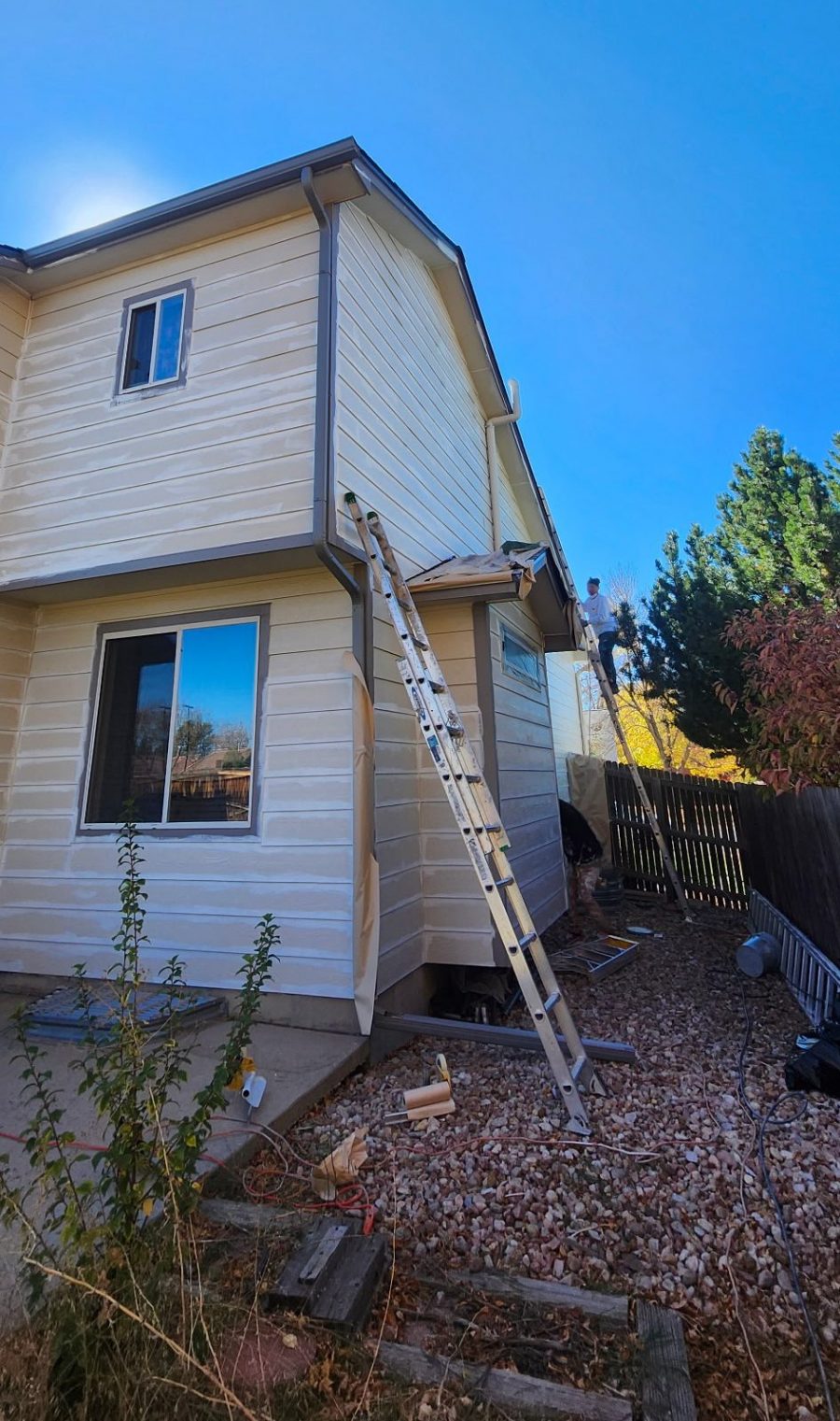 ladder against house with worn siding Preview Image 11